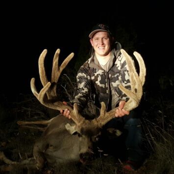 Blake Owens with buck in velvet
